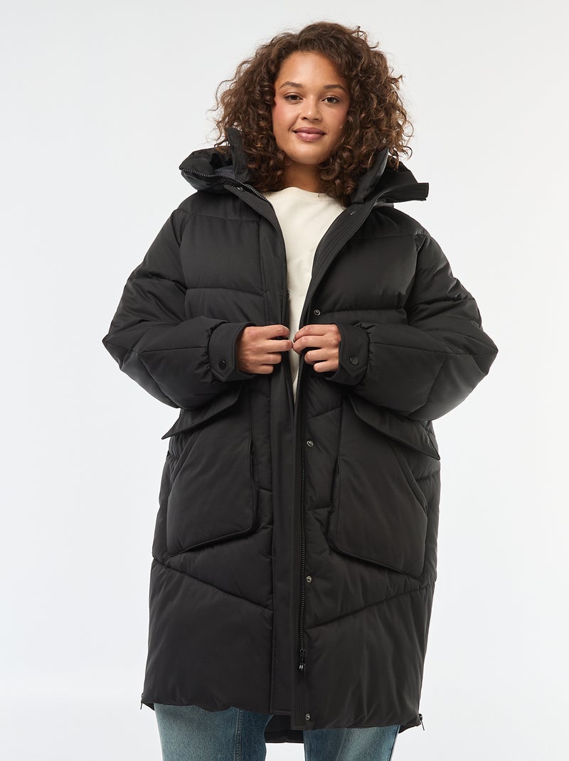 Casaco comprido acolchoado com capuz e bolsos com forro polar Preto - Kiabi