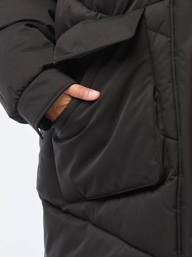 Casaco comprido acolchoado com capuz e bolsos com forro polar Preto - Kiabi