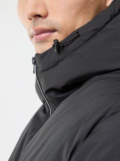 Casaco comprido acolchoado com capuz liso - Kiabi