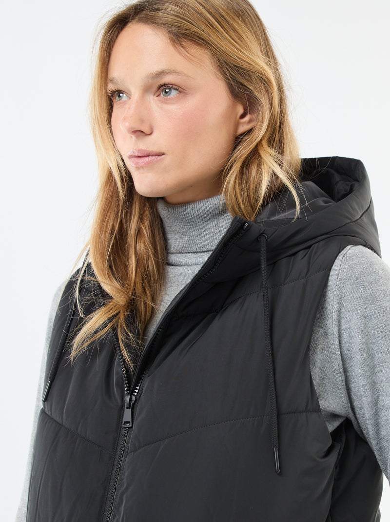 Casaco comprido acolchoado com capuz sem mangas Preto - Kiabi