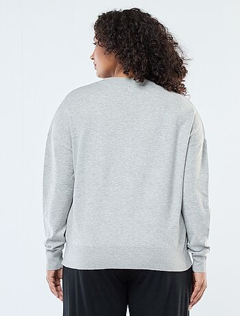 Casaco de malha fina com abertura de botões