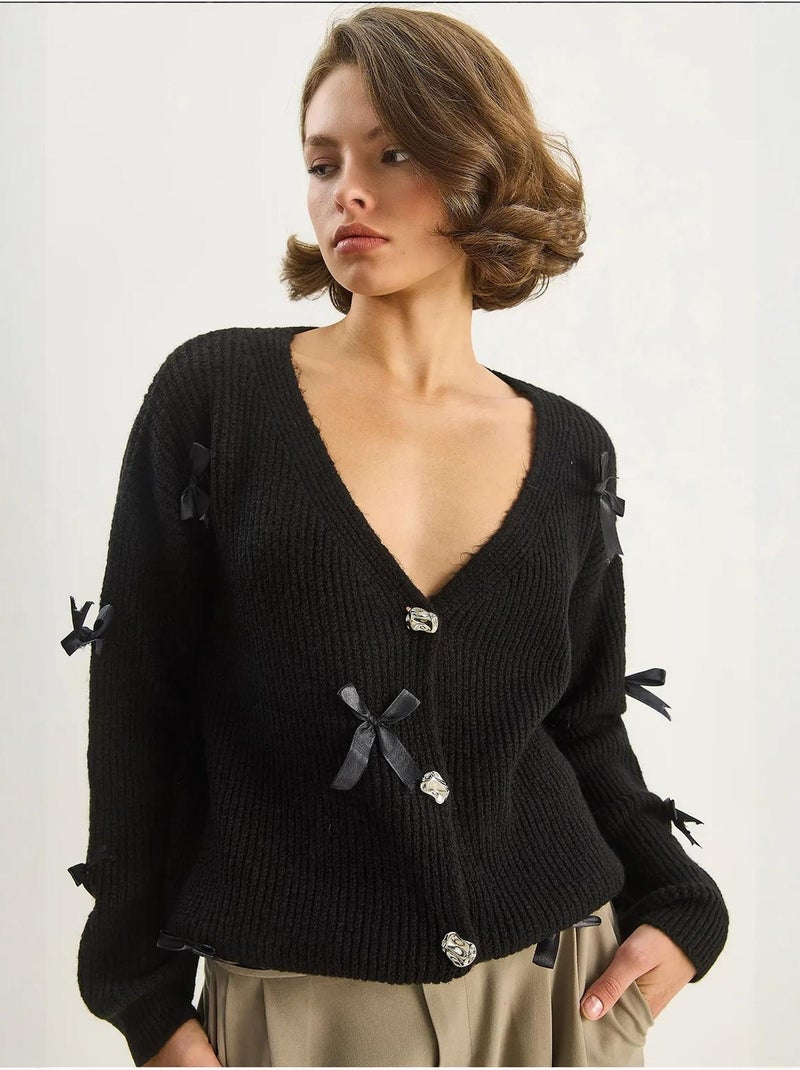 Casaco de malha oversized com detalhe de laço lucci Preto - Kiabi