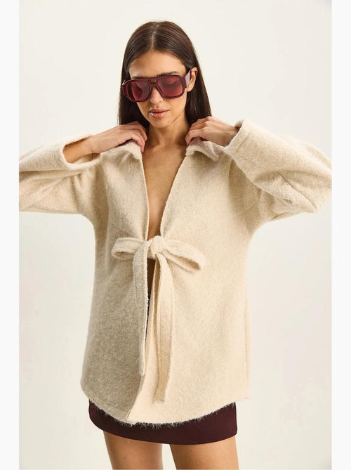 Casaco de malha oversized texturizado com decote em v e fecho de atar lucci - Kiabi Casaco de malha oversized texturizado com decote em v e fecho de atar lucci - Kiabi