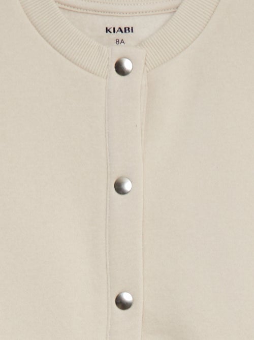 Casaco de manga comprida com abertura com molas de pressão - Kiabi Casaco de manga comprida com abertura com molas de pressão - Kiabi