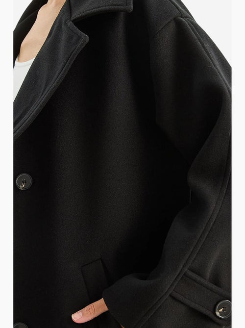 Casaco midi oversized com fecho de botões lucci - Kiabi Casaco midi oversized com fecho de botões lucci - Kiabi