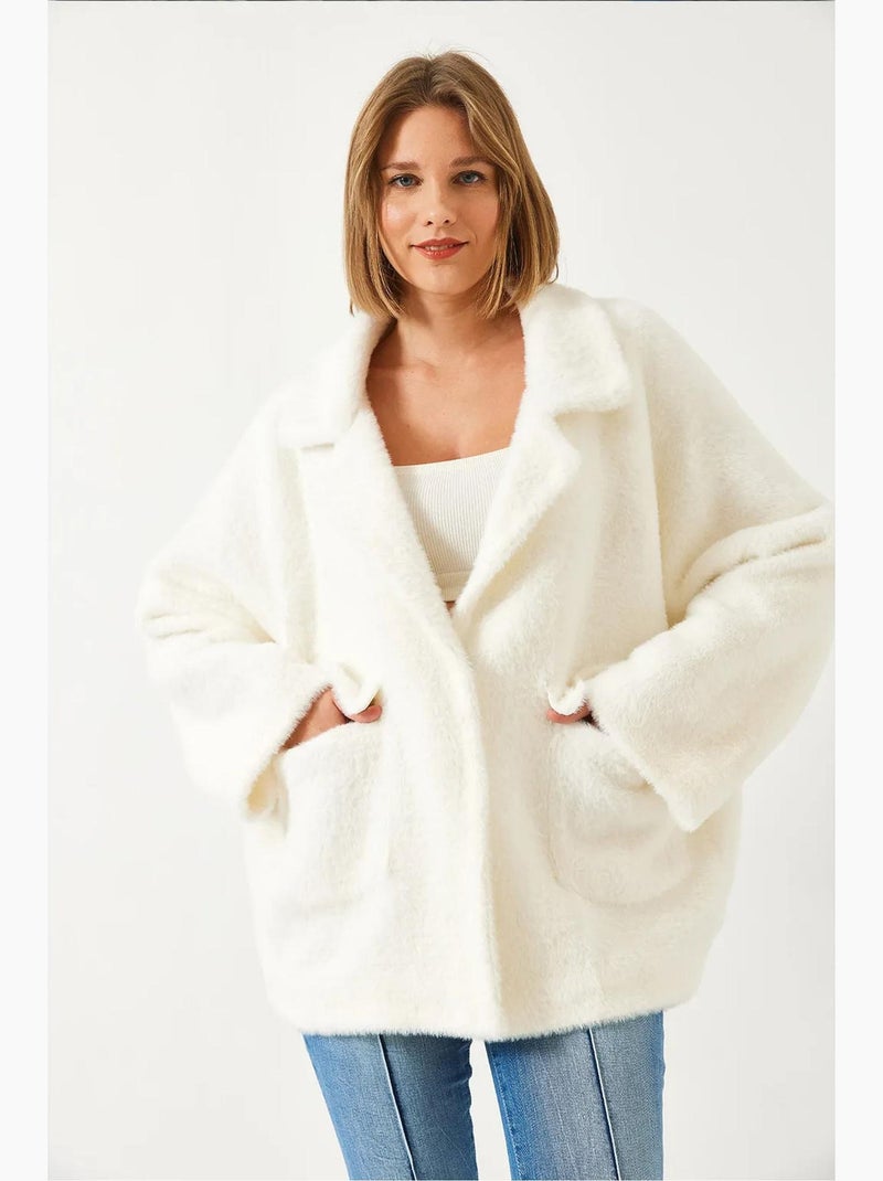 Casaco oversized em pelo sintético lucci Marfim - Kiabi