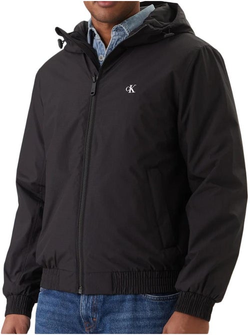 Casaco preto calvin klein jeans ripstop com capuz para homem - Kiabi Casaco preto calvin klein jeans ripstop com capuz para homem - Kiabi