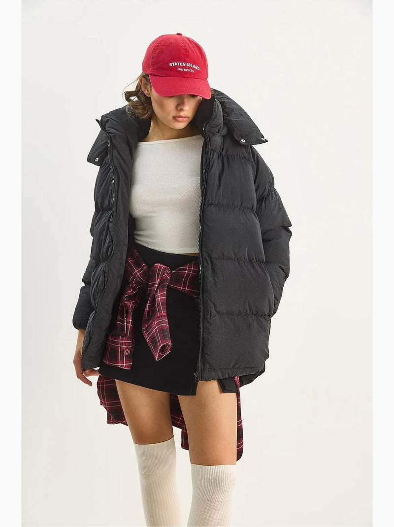 Casaco puffer oversized com capuz lucci Preto - Kiabi