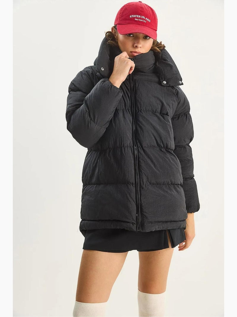 Casaco puffer oversized com capuz lucci Preto - Kiabi