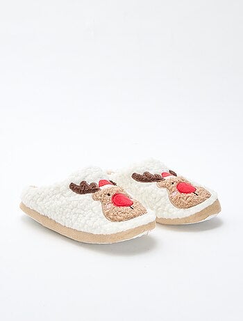 Chinelos tipo mule em material com efeito de pele de carneiro