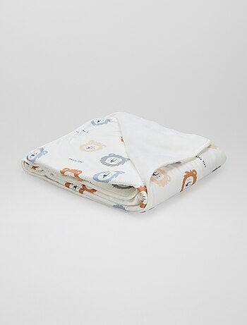 Cobertor estampado com interior efeito polar