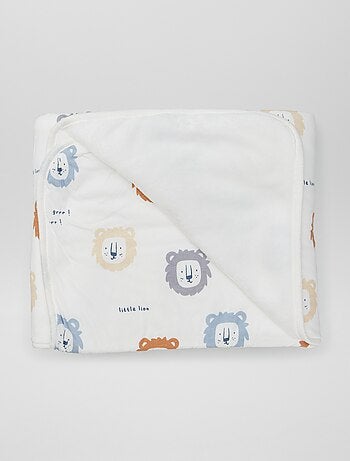 Cobertor estampado com interior efeito polar