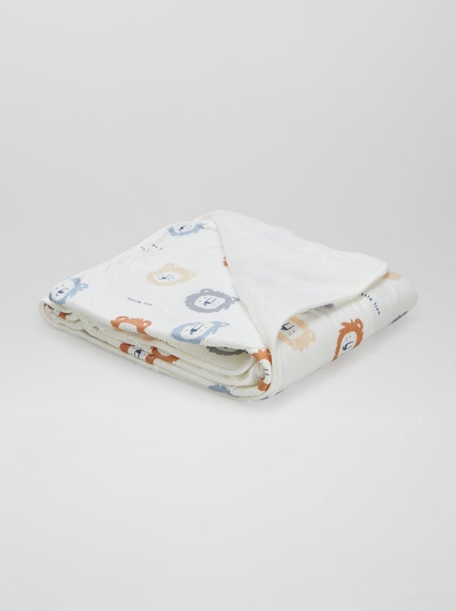 Cobertor estampado com interior efeito polar - Kiabi