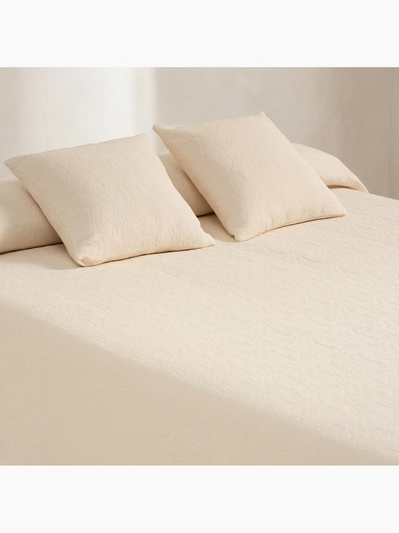 Colcha de algodão com design floral em relevo, tecido texturizado. Bege - Kiabi