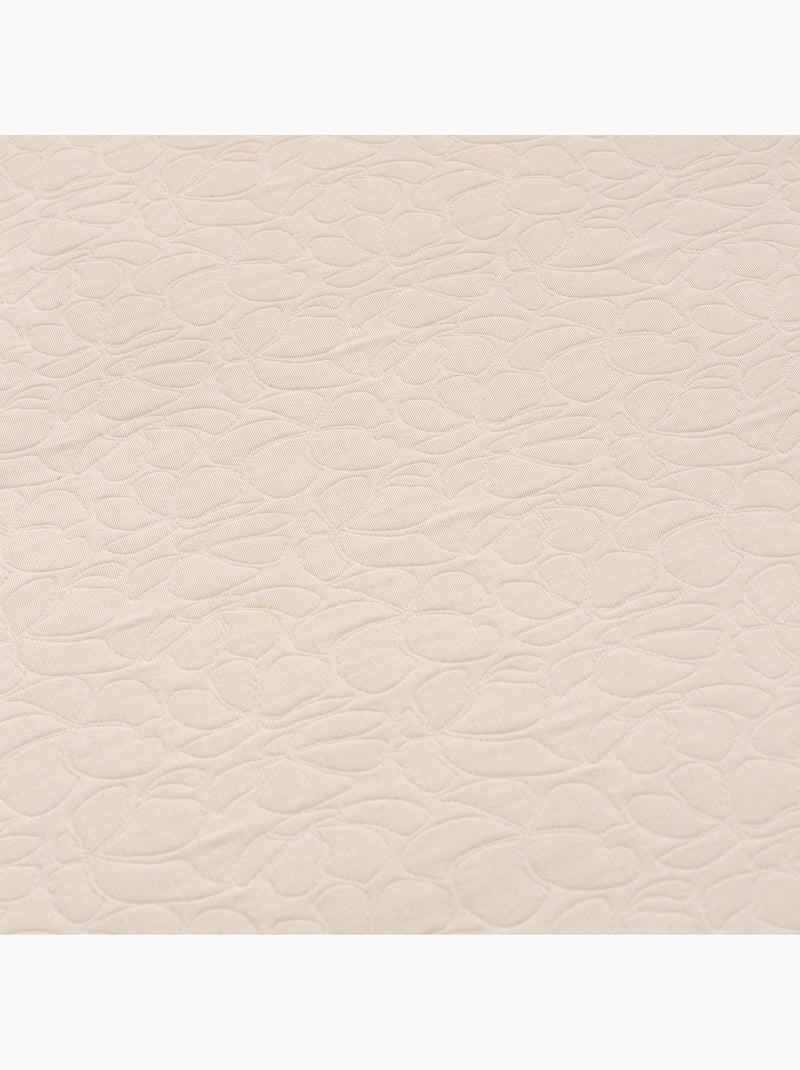 Colcha de algodão com design floral em relevo, tecido texturizado. Bege - Kiabi