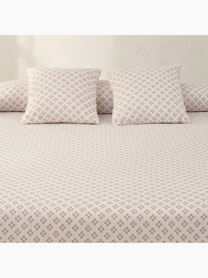 Colcha de algodão com design geométrico em relevo, tecido texturizado. Rosa - Kiabi