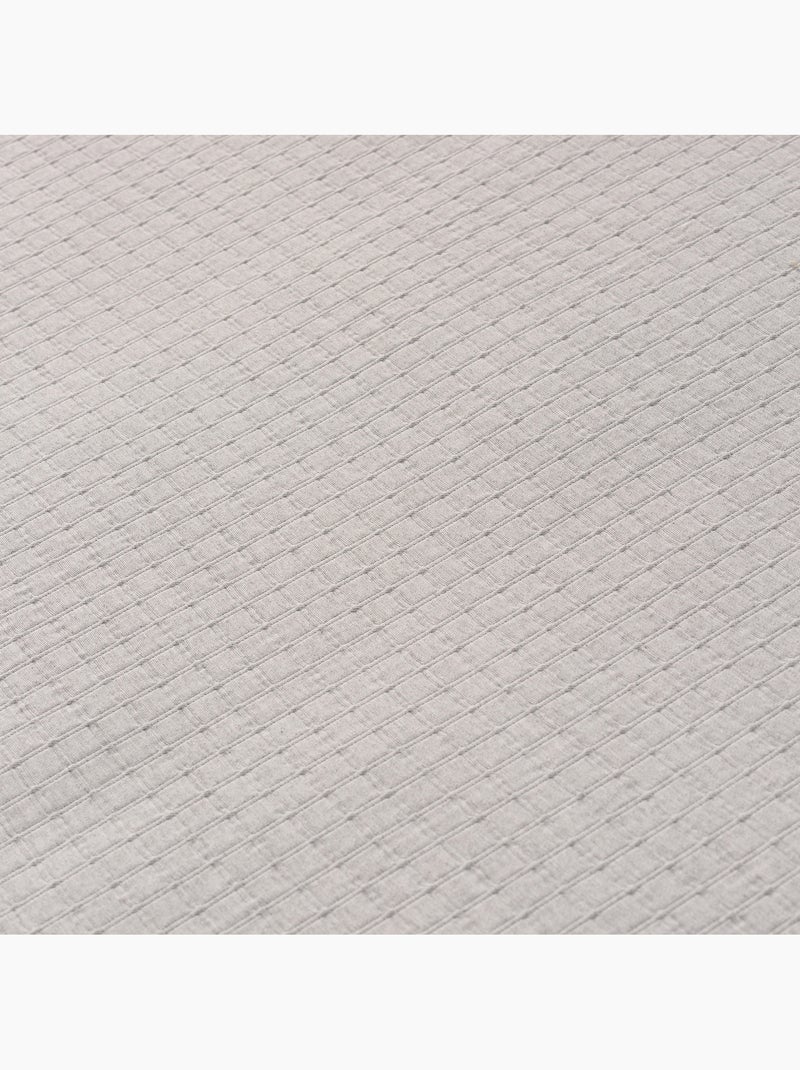 Colcha de algodão lisa, tecido texturizado em quadrados. Cinza - Kiabi