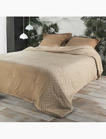 Colcha de cama com pequenas borlas