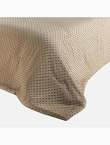 Colcha de cama com pequenas borlas