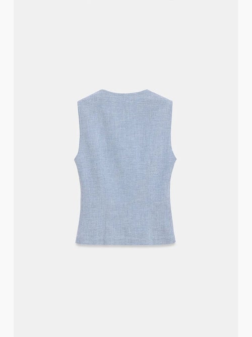 Colete ajustado em tecido com fecho frontal de botões dilvin - Kiabi Colete ajustado em tecido com fecho frontal de botões dilvin - Kiabi