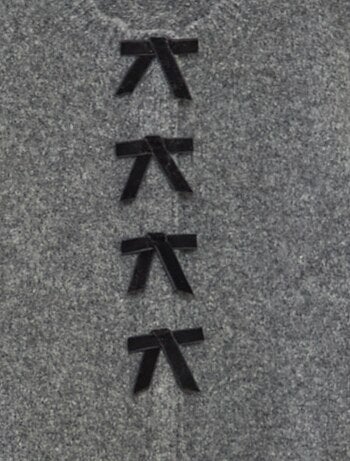 Colete com abertura de nós