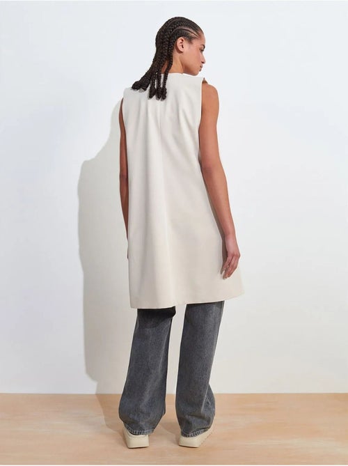 Colete comprido em crepe tecido com detalhe cut-out dilvin - Kiabi