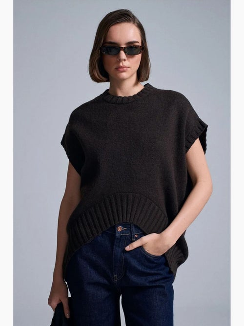 Colete de camisola de malha canelada oversized dilvin - Kiabi Colete de camisola de malha canelada oversized dilvin - Kiabi
