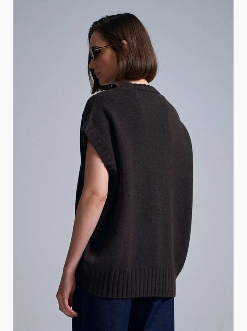 Colete de camisola de malha canelada oversized dilvin - Kiabi Colete de camisola de malha canelada oversized dilvin - Kiabi
