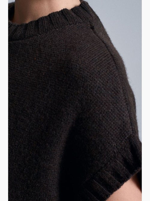 Colete de camisola de malha canelada oversized dilvin - Kiabi Colete de camisola de malha canelada oversized dilvin - Kiabi
