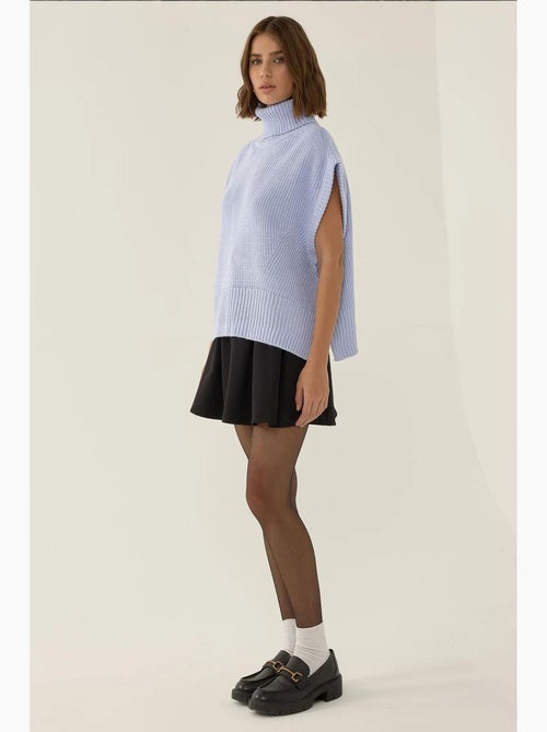 Colete de malha de gola alta relaxed fit hiccup - Kiabi Colete de malha de gola alta relaxed fit hiccup - Kiabi
