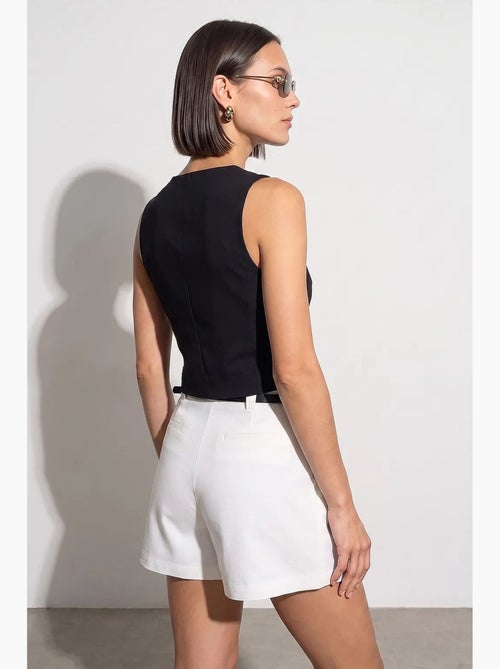 Colete feminino de crepe tecido dilvin - Kiabi Colete feminino de crepe tecido dilvin - Kiabi