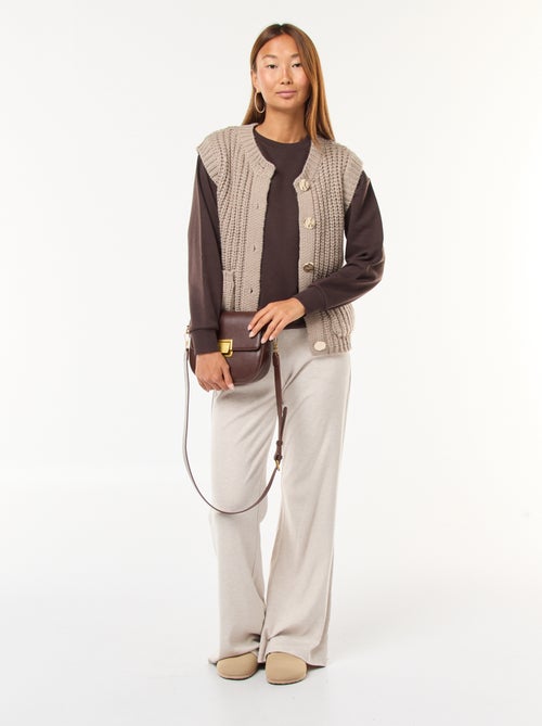 Colete sem mangas com abertura abotoada - Kiabi