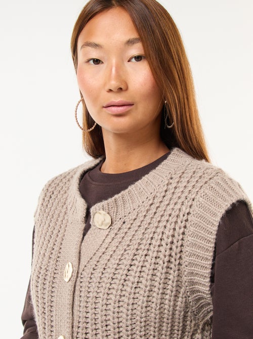 Colete sem mangas com abertura abotoada - Kiabi