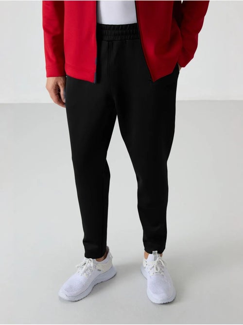 Conjunto active de homem em scuba de poliéster com gola com fecho de correr tommy - Kiabi Conjunto active de homem em scuba de poliéster com gola com fecho de correr tommy - Kiabi
