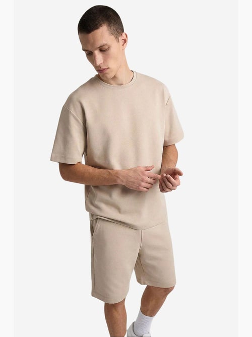 Conjunto active masculino em poliéster-elastano tommy - Kiabi Conjunto active masculino em poliéster-elastano tommy - Kiabi