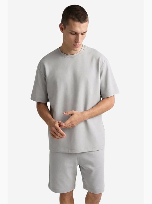 Conjunto active masculino em poliéster-elastano tommy - Kiabi Conjunto active masculino em poliéster-elastano tommy - Kiabi