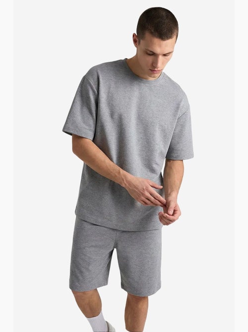Conjunto active masculino em poliéster-elastano tommy - Kiabi Conjunto active masculino em poliéster-elastano tommy - Kiabi