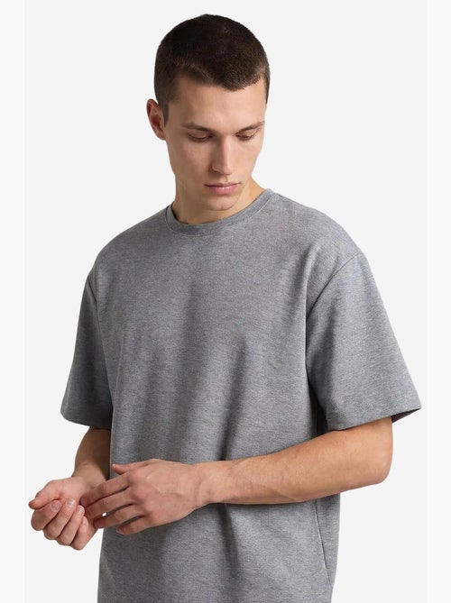Conjunto active masculino em poliéster-elastano tommy - Kiabi Conjunto active masculino em poliéster-elastano tommy - Kiabi