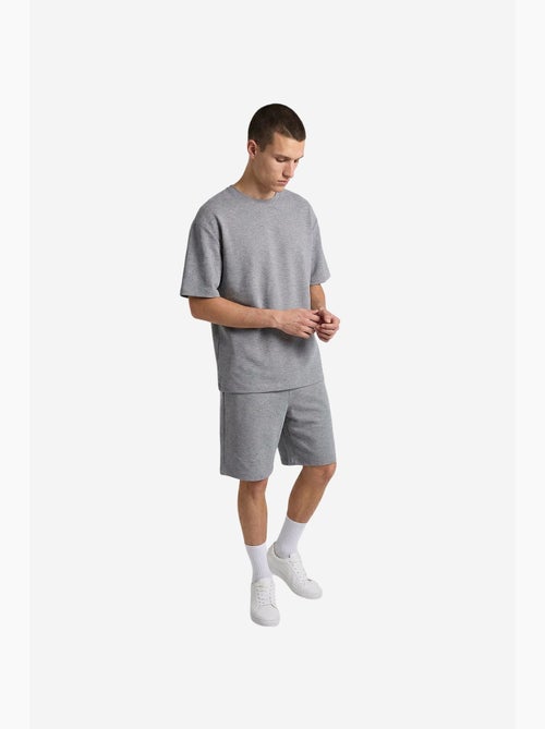 Conjunto active masculino em poliéster-elastano tommy - Kiabi Conjunto active masculino em poliéster-elastano tommy - Kiabi