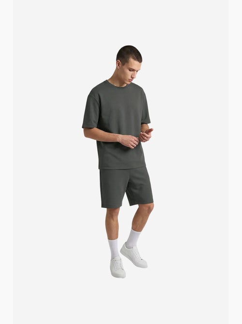 Conjunto active masculino em poliéster-elastano tommy - Kiabi Conjunto active masculino em poliéster-elastano tommy - Kiabi
