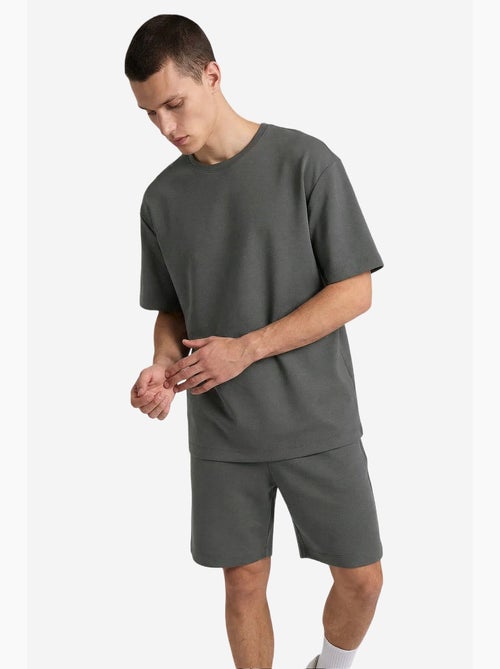 Conjunto active masculino em poliéster-elastano tommy - Kiabi Conjunto active masculino em poliéster-elastano tommy - Kiabi