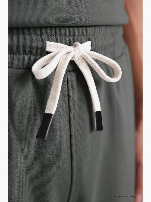 Conjunto active masculino em poliéster-elastano tommy - Kiabi Conjunto active masculino em poliéster-elastano tommy - Kiabi