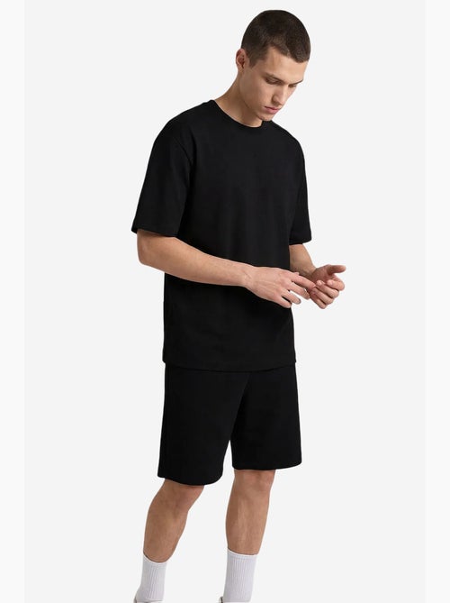 Conjunto active masculino em poliéster-elastano tommy - Kiabi Conjunto active masculino em poliéster-elastano tommy - Kiabi