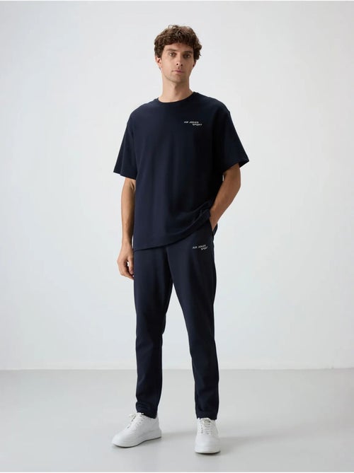 Conjunto active oversize em algodão e poliéster para homem tommy - Kiabi Conjunto active oversize em algodão e poliéster para homem tommy - Kiabi