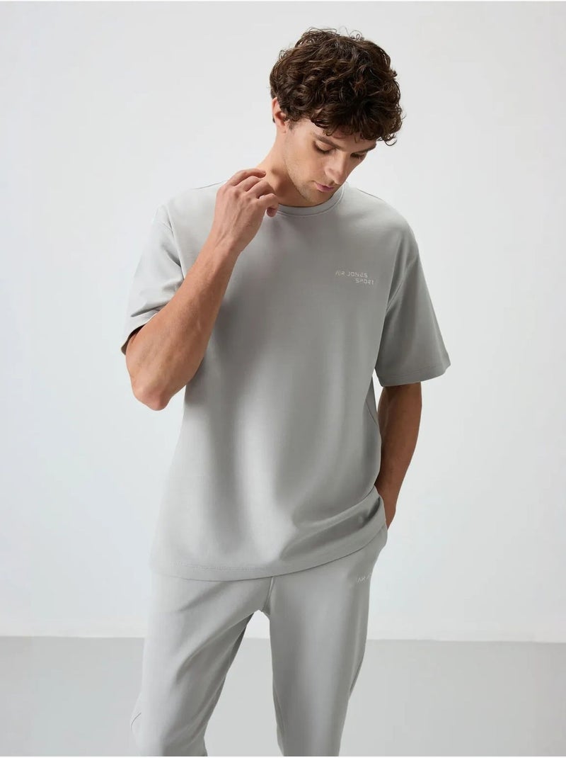 Conjunto active oversize em algodão e poliéster para homem tommy Cinza claro - Kiabi