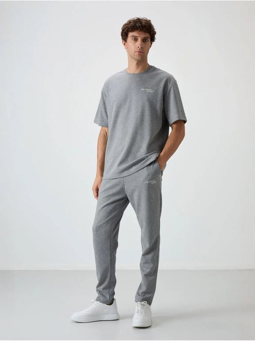 Conjunto active oversize em algodão e poliéster para homem tommy - Kiabi Conjunto active oversize em algodão e poliéster para homem tommy - Kiabi