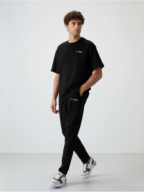Conjunto active oversize em algodão e poliéster para homem tommy - Kiabi Conjunto active oversize em algodão e poliéster para homem tommy - Kiabi