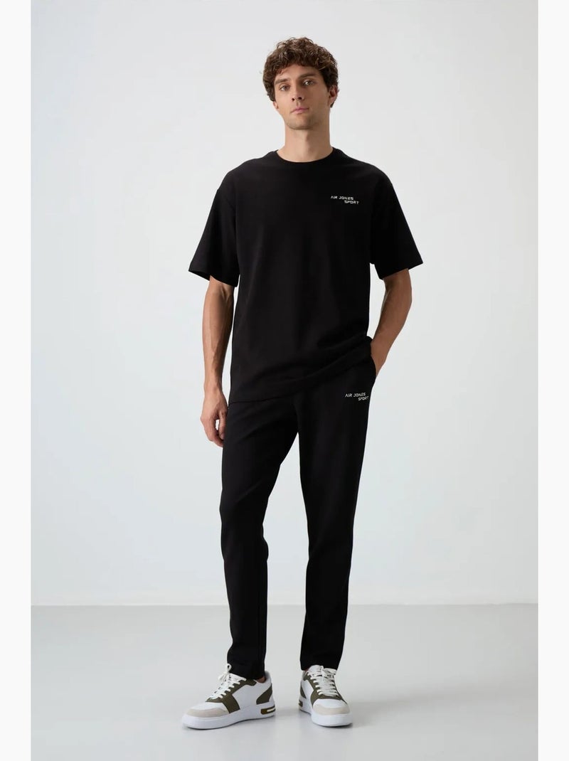 Conjunto active oversize em algodão e poliéster para homem tommy Preto - Kiabi