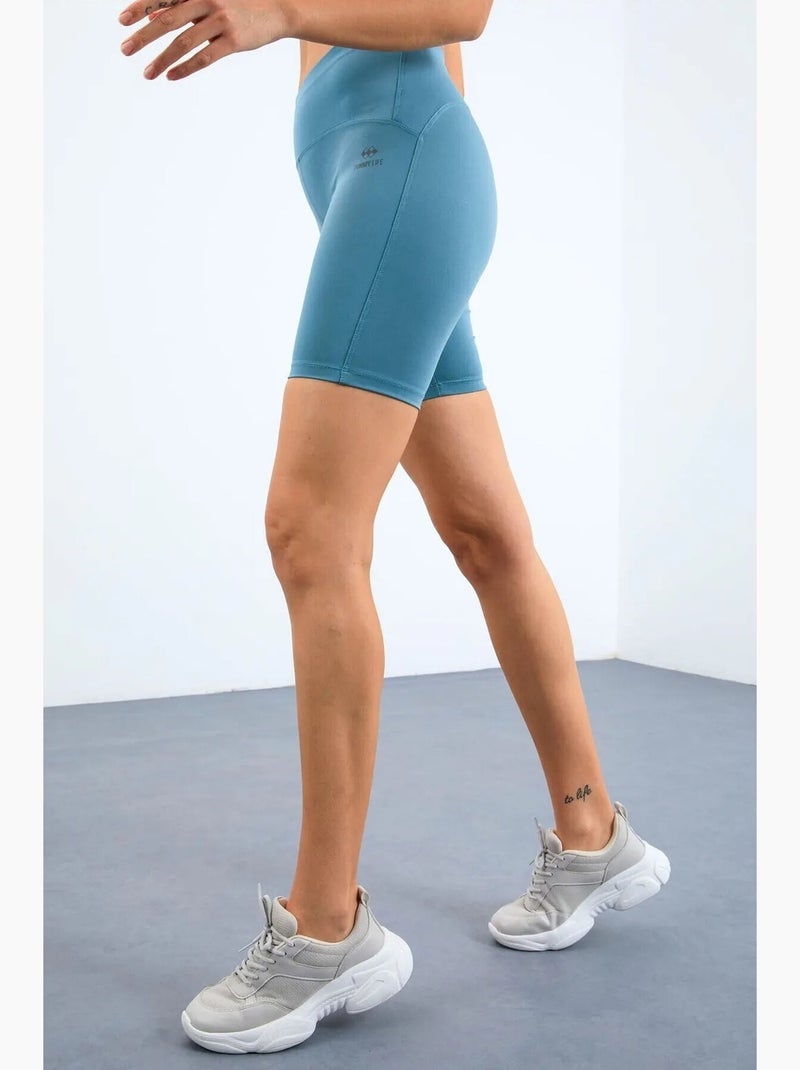 Conjunto active sem mangas com decote redondo e calções de ciclismo tommy Azul - Kiabi