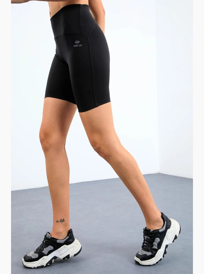 Conjunto active sem mangas com decote redondo e calções de ciclismo tommy Preto - Kiabi